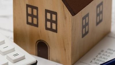 Symbolbild mit Taschenrechner