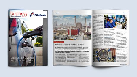 Eine Ausgabe des business-Magazins mit Artikel zu E-Mobilität und Heizkraftwerk, mit Stadt- und Kontrollraumbildern.